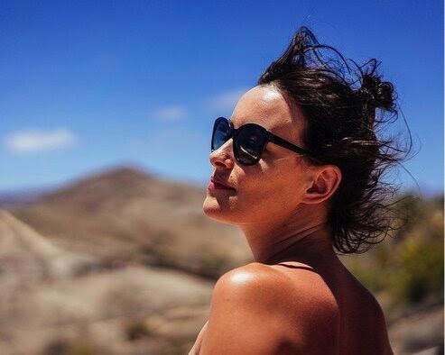 Woman looks away from the camera.